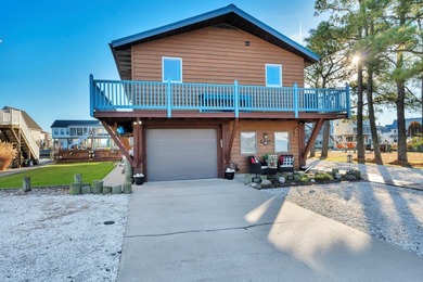 INCREDIBLE WATERFRONT WONDERLAND in Captain's Cove Golf & Yacht on Captains Cove Golf and Yacht Club in Virginia - for sale on GolfHomes.com, golf home, golf lot