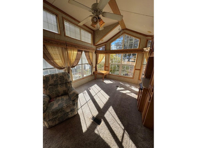 You have to check out this beautiful park model on a corner lot on Captains Cove Golf and Yacht Club in Virginia - for sale on GolfHomes.com, golf home, golf lot