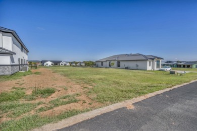 A beautiful, single-family level lot in Clearwater Landing on Legends Golf Course in Texas - for sale on GolfHomes.com, golf home, golf lot