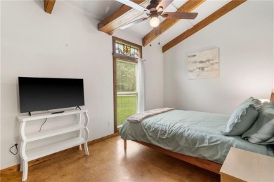 Tucked into the trees just minutes from Bentonville, this on Bella Vista - Metfield Golf Complex and Country Club in Arkansas - for sale on GolfHomes.com, golf home, golf lot