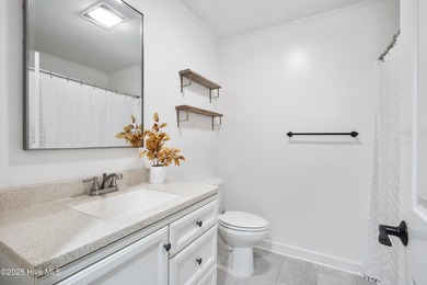 Tucked away among the lovely trees, this brick ranch is nestled on Southern Pines Country Club in North Carolina - for sale on GolfHomes.com, golf home, golf lot