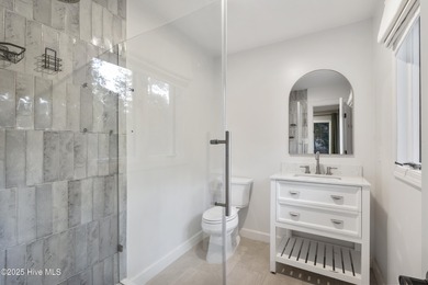 Tucked away among the lovely trees, this brick ranch is nestled on Southern Pines Country Club in North Carolina - for sale on GolfHomes.com, golf home, golf lot