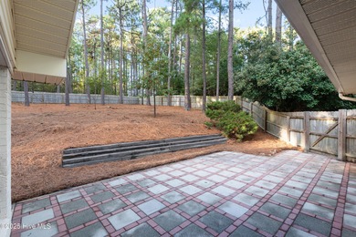Tucked away among the lovely trees, this brick ranch is nestled on Southern Pines Country Club in North Carolina - for sale on GolfHomes.com, golf home, golf lot