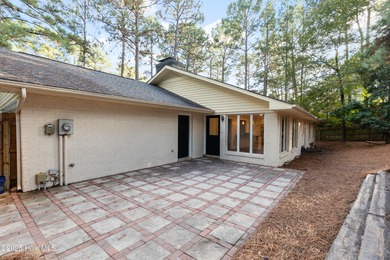 Tucked away among the lovely trees, this brick ranch is nestled on Southern Pines Country Club in North Carolina - for sale on GolfHomes.com, golf home, golf lot
