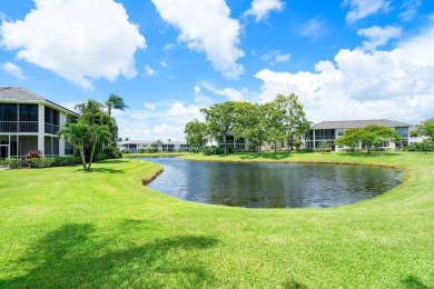 Gorgeous ground-level condo boasting picturesque panoramic lake on Polo Club of Boca Raton in Florida - for sale on GolfHomes.com, golf home, golf lot