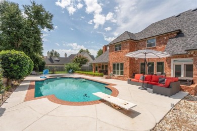 Welcome to this beautiful home in the well sought after Oak Tree on Oak Tree National Golf and Country Club in Oklahoma - for sale on GolfHomes.com, golf home, golf lot