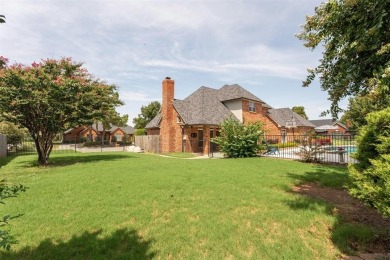 Welcome to this beautiful home in the well sought after Oak Tree on Oak Tree National Golf and Country Club in Oklahoma - for sale on GolfHomes.com, golf home, golf lot
