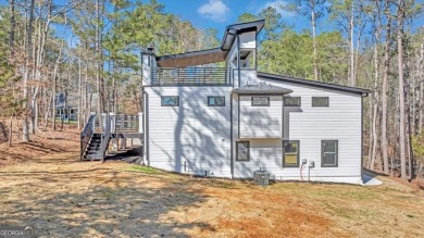 Welcome to this breathtaking luxury 3-bedroom, 3-bathroom room on Fairfield Plantation Golf and Country Club in Georgia - for sale on GolfHomes.com, golf home, golf lot