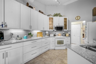 Stylish, low-maintenance living awaits in this beautifully on Peridia Golf and Country Club in Florida - for sale on GolfHomes.com, golf home, golf lot