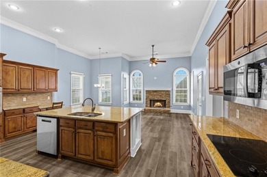 Discover elegance and comfort in this stunning home nestled in on Traditions of Braselton Golf Club in Georgia - for sale on GolfHomes.com, golf home, golf lot