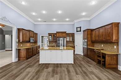 Discover elegance and comfort in this stunning home nestled in on Traditions of Braselton Golf Club in Georgia - for sale on GolfHomes.com, golf home, golf lot