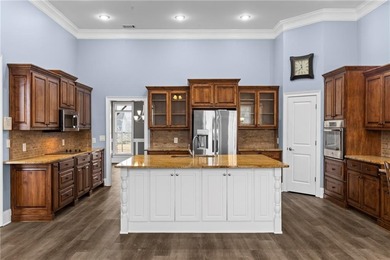 Discover elegance and comfort in this stunning home nestled in on Traditions of Braselton Golf Club in Georgia - for sale on GolfHomes.com, golf home, golf lot