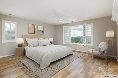 Million Dollar Views and morning sunrises from behind the on Hendersonville Country Club in North Carolina - for sale on GolfHomes.com, golf home, golf lot