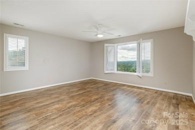 Million Dollar Views and morning sunrises from behind the on Hendersonville Country Club in North Carolina - for sale on GolfHomes.com, golf home, golf lot