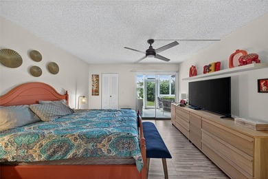 First-floor, fully renovated lakefront residence designed for on Wynmoor Golf Course in Florida - for sale on GolfHomes.com, golf home, golf lot