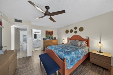 FIRST FLOOR -- COMPLETELY RENOVATED LAKEFRONT HOME that will on Wynmoor Golf Course in Florida - for sale on GolfHomes.com, golf home, golf lot