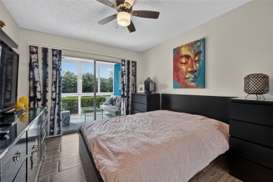 FIRST FLOOR -- COMPLETELY RENOVATED LAKEFRONT HOME that will on Wynmoor Golf Course in Florida - for sale on GolfHomes.com, golf home, golf lot