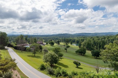 Million Dollar Views and morning sunrises from behind the on Hendersonville Country Club in North Carolina - for sale on GolfHomes.com, golf home, golf lot