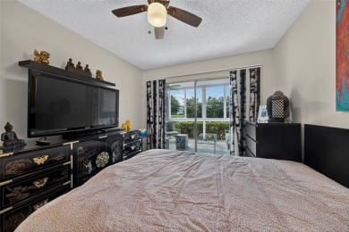 FIRST FLOOR -- COMPLETELY RENOVATED LAKEFRONT HOME that will on Wynmoor Golf Course in Florida - for sale on GolfHomes.com, golf home, golf lot
