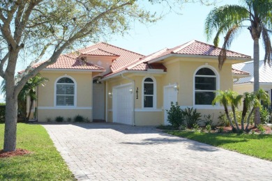 Charming Lakefront 3/2/3, home with golf cart bay situated in on Meadowood Golf and Tennis Club in Florida - for sale on GolfHomes.com, golf home, golf lot