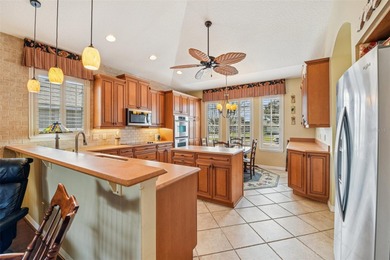 Welcome home to easy comfortable living on the 15th fairway of on Country Club of Mount Dora in Florida - for sale on GolfHomes.com, golf home, golf lot