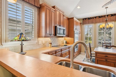 Welcome home to easy comfortable living on the 15th fairway of on Country Club of Mount Dora in Florida - for sale on GolfHomes.com, golf home, golf lot