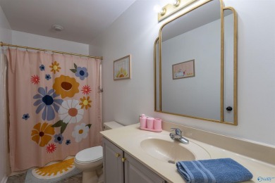 DISCOVER YOUR DREAM HOME IN THE HEART OF TWIN PINES SUBDIVISION on Twin Pines Golf Course in Alabama - for sale on GolfHomes.com, golf home, golf lot