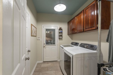 DISCOVER YOUR DREAM HOME IN THE HEART OF TWIN PINES SUBDIVISION on Twin Pines Golf Course in Alabama - for sale on GolfHomes.com, golf home, golf lot