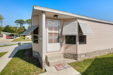 Step into this warm and welcoming 2 bed/ 2 bath completely on Spanish Lakes Fairways in Florida - for sale on GolfHomes.com, golf home, golf lot