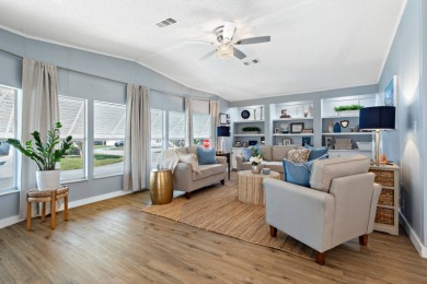 Step into this warm and welcoming 2 bed/ 2 bath completely on Spanish Lakes Fairways in Florida - for sale on GolfHomes.com, golf home, golf lot