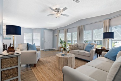 Step into this warm and welcoming 2 bed/ 2 bath completely on Spanish Lakes Fairways in Florida - for sale on GolfHomes.com, golf home, golf lot