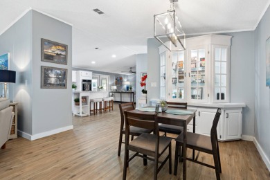 Step into this warm and welcoming 2 bed/ 2 bath completely on Spanish Lakes Fairways in Florida - for sale on GolfHomes.com, golf home, golf lot