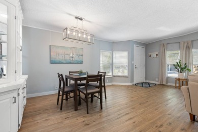 Step into this warm and welcoming 2 bed/ 2 bath completely on Spanish Lakes Fairways in Florida - for sale on GolfHomes.com, golf home, golf lot