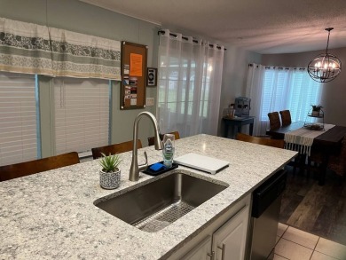 Experience resort style living in this beautifully furnished on Four Lakes Golf Club in Florida - for sale on GolfHomes.com, golf home, golf lot