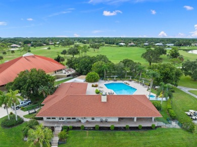 Rarely available 2-bedroom, 2-bathroom first-floor corner unit on Meadowood Golf and Tennis Club in Florida - for sale on GolfHomes.com, golf home, golf lot