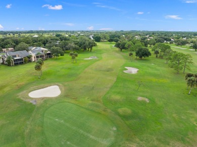 Rarely available 2-bedroom, 2-bathroom first-floor corner unit on Meadowood Golf and Tennis Club in Florida - for sale on GolfHomes.com, golf home, golf lot