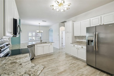 One or more photos have been virtually staged.    GREAT PRICE on Poinciana Golf Club in Florida - for sale on GolfHomes.com, golf home, golf lot