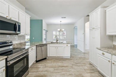 One or more photos have been virtually staged.    GREAT PRICE on Poinciana Golf Club in Florida - for sale on GolfHomes.com, golf home, golf lot