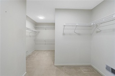 Welcome to a perfectly situated home in the heart of Windward on The Golf Club of Georgia in Georgia - for sale on GolfHomes.com, golf home, golf lot