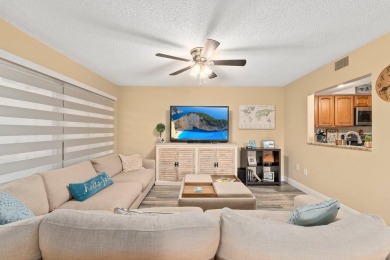 Rarely available 2-bedroom, 2-bathroom first-floor corner unit on Meadowood Golf and Tennis Club in Florida - for sale on GolfHomes.com, golf home, golf lot