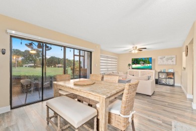 Rarely available 2-bedroom, 2-bathroom first-floor corner unit on Meadowood Golf and Tennis Club in Florida - for sale on GolfHomes.com, golf home, golf lot