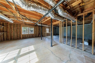 Welcome to a perfectly situated home in the heart of Windward on The Golf Club of Georgia in Georgia - for sale on GolfHomes.com, golf home, golf lot