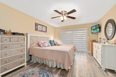 Rarely available 2-bedroom, 2-bathroom first-floor corner unit on Meadowood Golf and Tennis Club in Florida - for sale on GolfHomes.com, golf home, golf lot