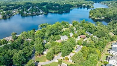 Welcome to a perfectly situated home in the heart of Windward on The Golf Club of Georgia in Georgia - for sale on GolfHomes.com, golf home, golf lot