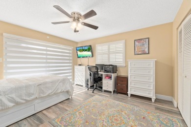 Rarely available 2-bedroom, 2-bathroom first-floor corner unit on Meadowood Golf and Tennis Club in Florida - for sale on GolfHomes.com, golf home, golf lot