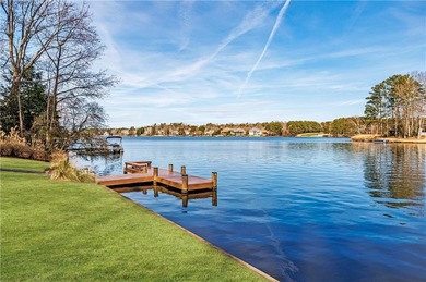 Welcome to a perfectly situated home in the heart of Windward on The Golf Club of Georgia in Georgia - for sale on GolfHomes.com, golf home, golf lot