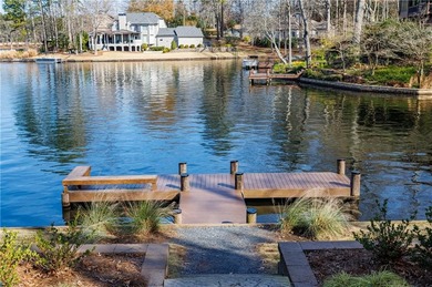 Welcome to a perfectly situated home in the heart of Windward on The Golf Club of Georgia in Georgia - for sale on GolfHomes.com, golf home, golf lot