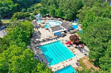 Welcome to a perfectly situated home in the heart of Windward on The Golf Club of Georgia in Georgia - for sale on GolfHomes.com, golf home, golf lot