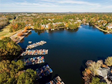 Welcome to a perfectly situated home in the heart of Windward on The Golf Club of Georgia in Georgia - for sale on GolfHomes.com, golf home, golf lot