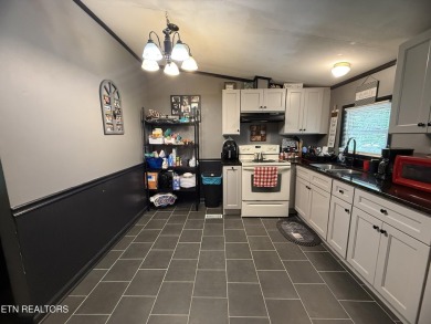 Charming home in the Wilshire Heights neighborhood of Fairfield on Stonehenge Golf Course in Tennessee - for sale on GolfHomes.com, golf home, golf lot